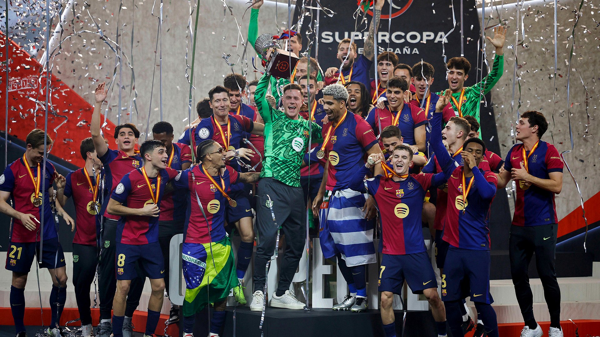 Real Madrid and FC Barcelona players contesting the Spanish Super Cup final
